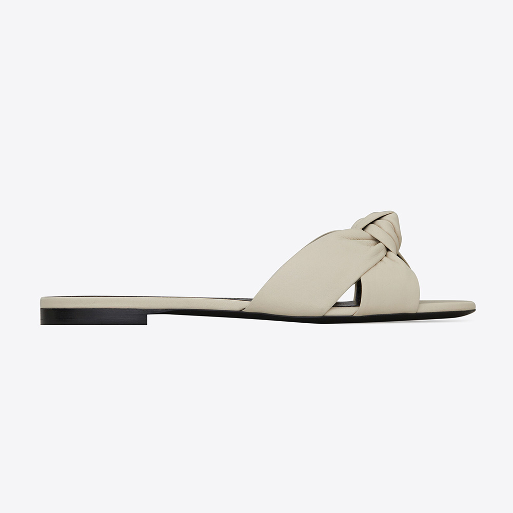 Front profile of Saint Laurent YSL Women Bianca Flat Mules in white