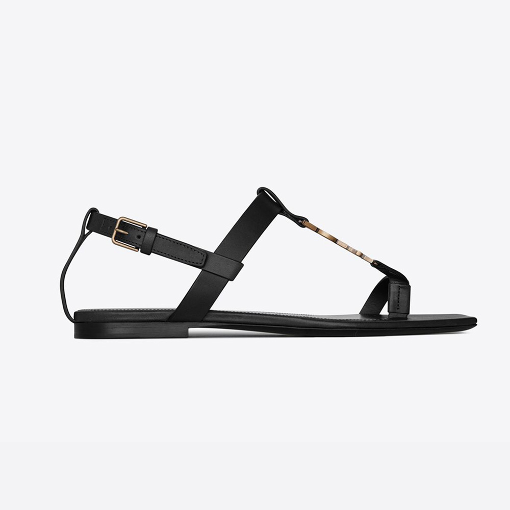 Side view of Saint Laurent YSL Women Cassandra Flat Sandals black leather