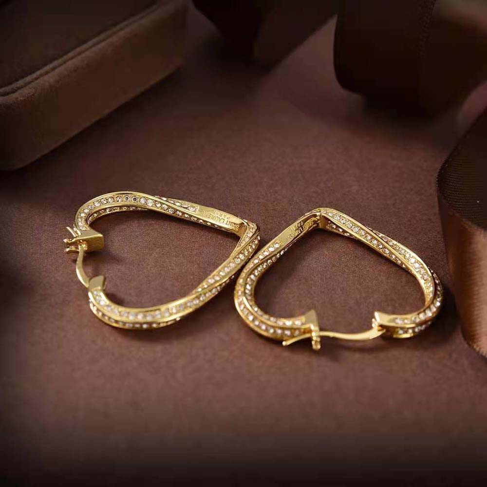 Side angle showing twisted heart detail on Saint Laurent YSL earrings