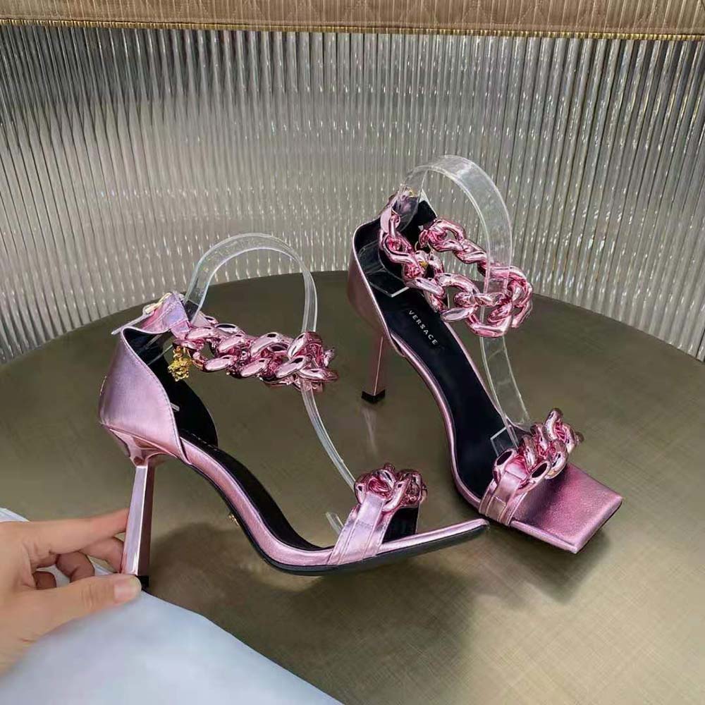 Back angle showing ankle strap and heel of Versace Medusa Chain Sandals