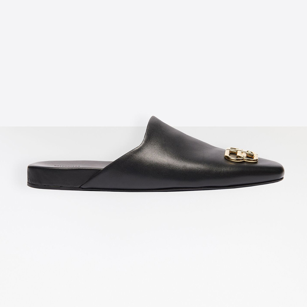 Side view of Balenciaga Women Cosy BB Slide showing black calfskin and aged-gold hardware