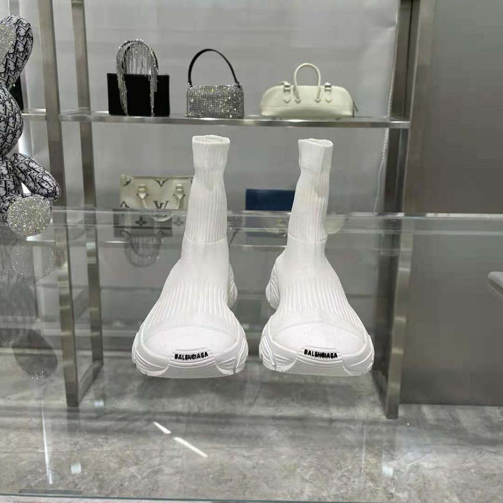 Close-up on white recycled knit texture of Balenciaga Speed 3.0 sneaker