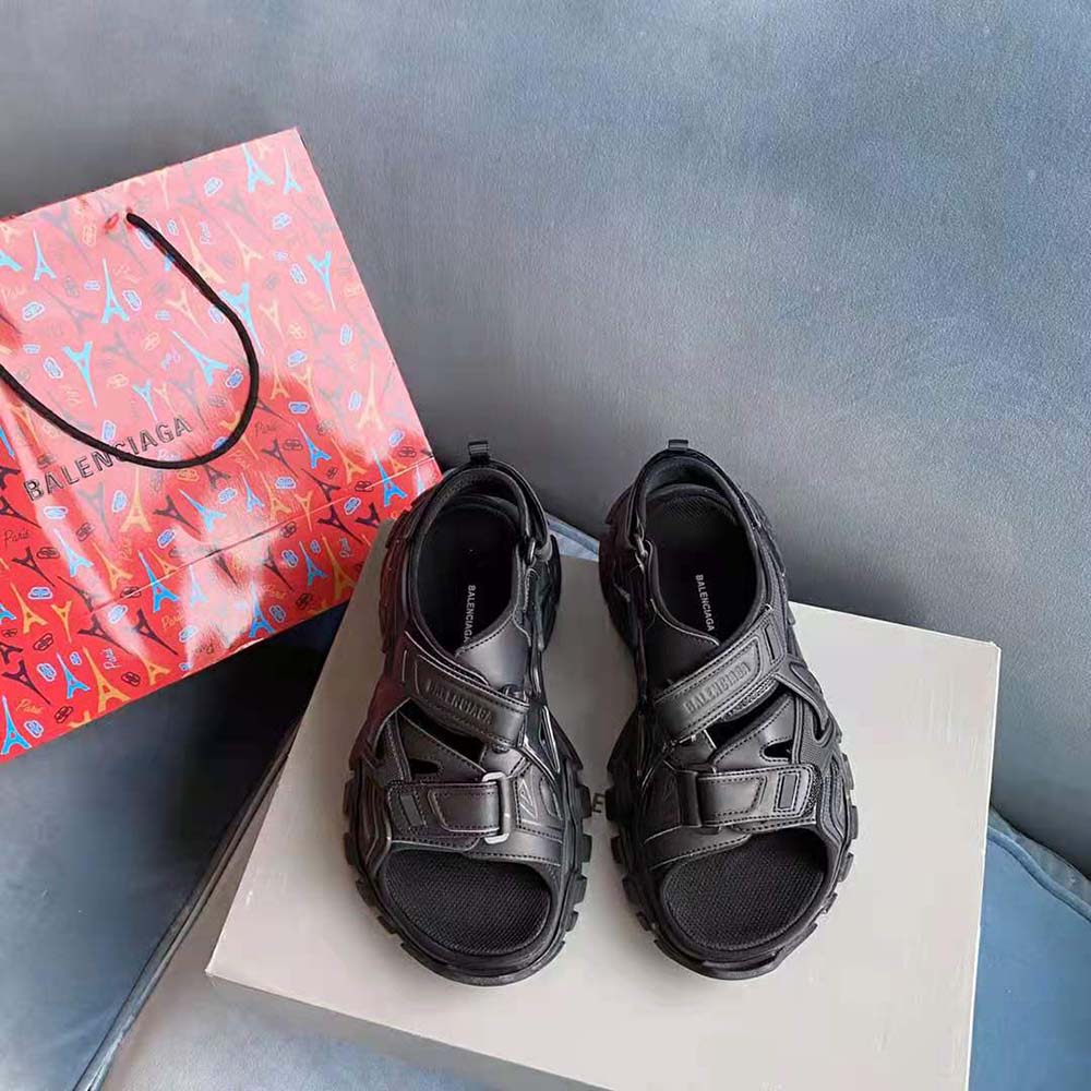 Top-down look at slip-on design and branding of Balenciaga Women Track Sandal