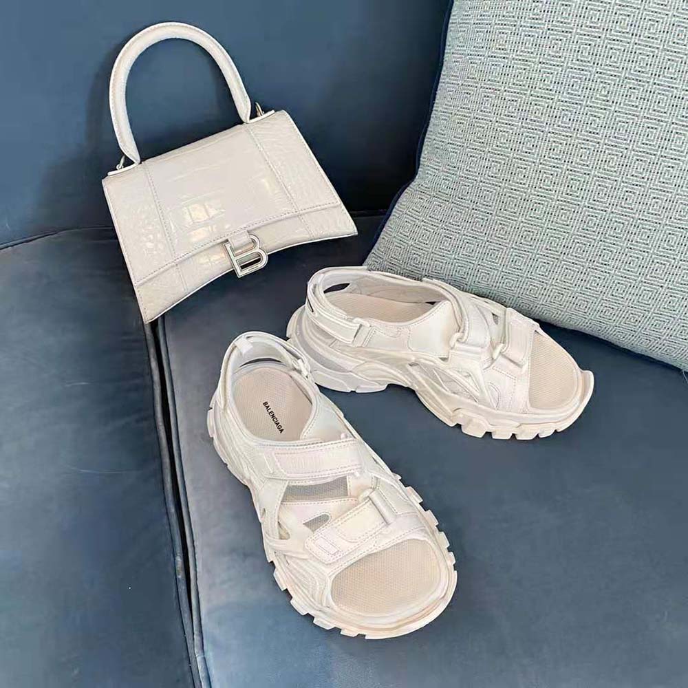 Close-up of adjustable strap with Balenciaga branding on white Track Sandal