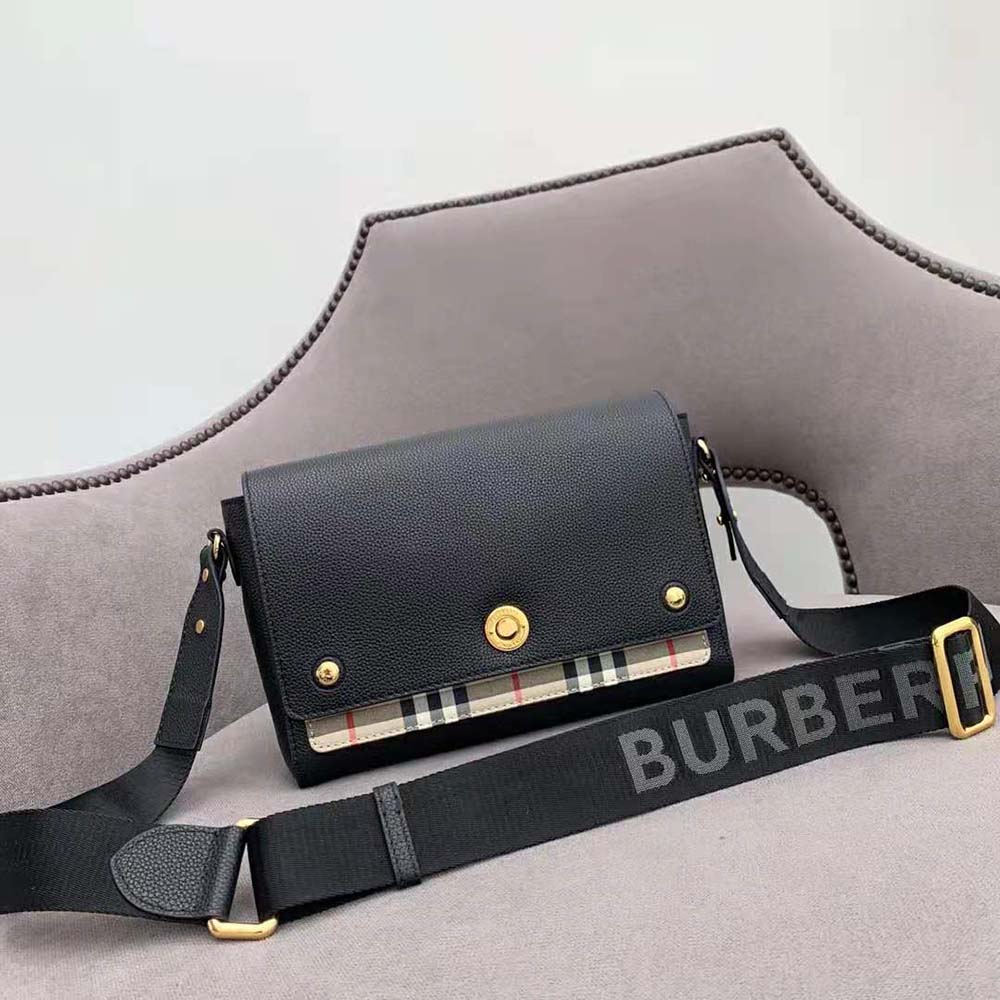 Close-up of vintage check and leather detail on Burberry crossbody bag