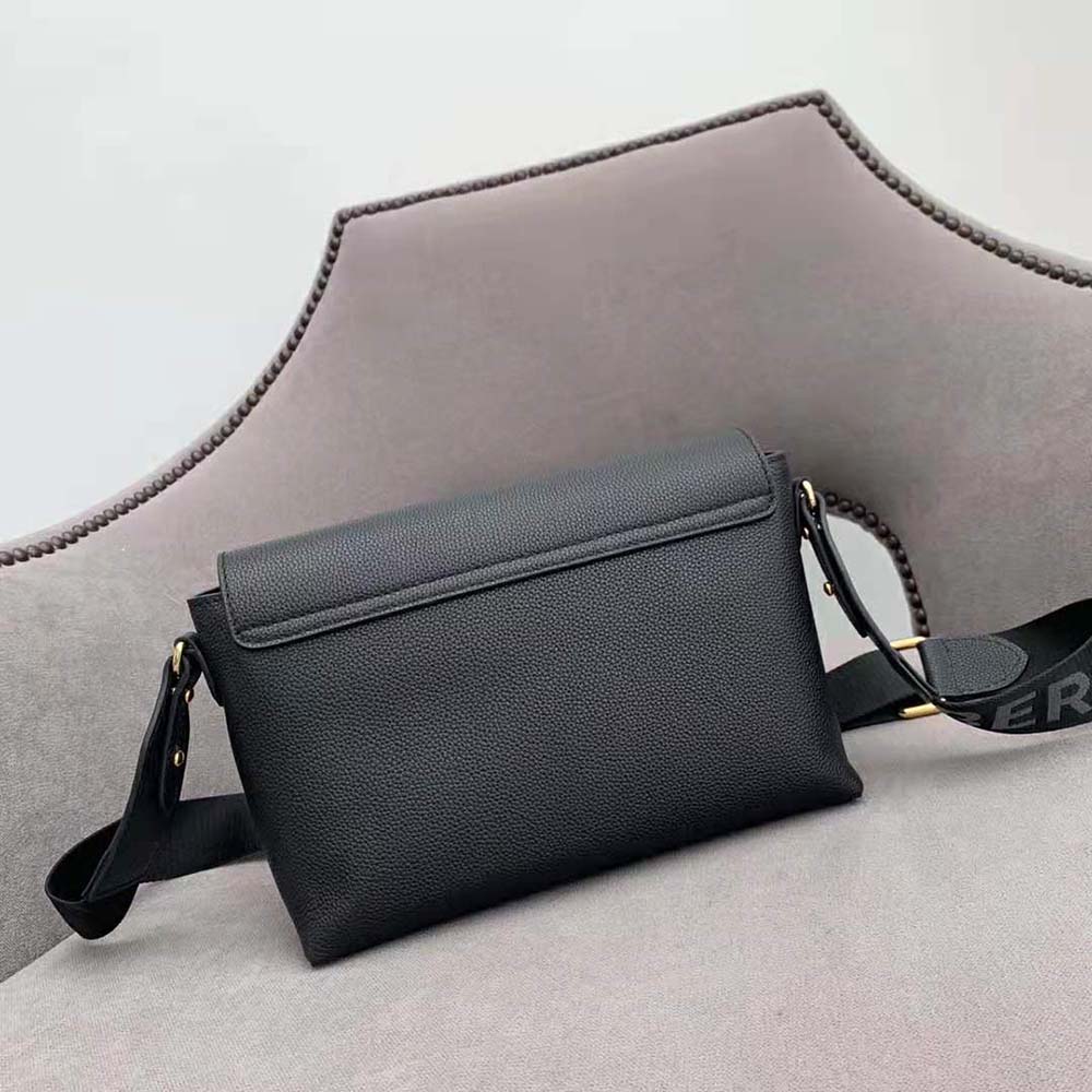 Side angle showing gold hardware on Burberry Women Leather and Vintage Check Note Crossbody Bag-Black
