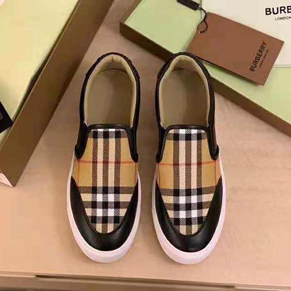 Close-up detailing of vintage check fabric on Burberry slip-on sneakers