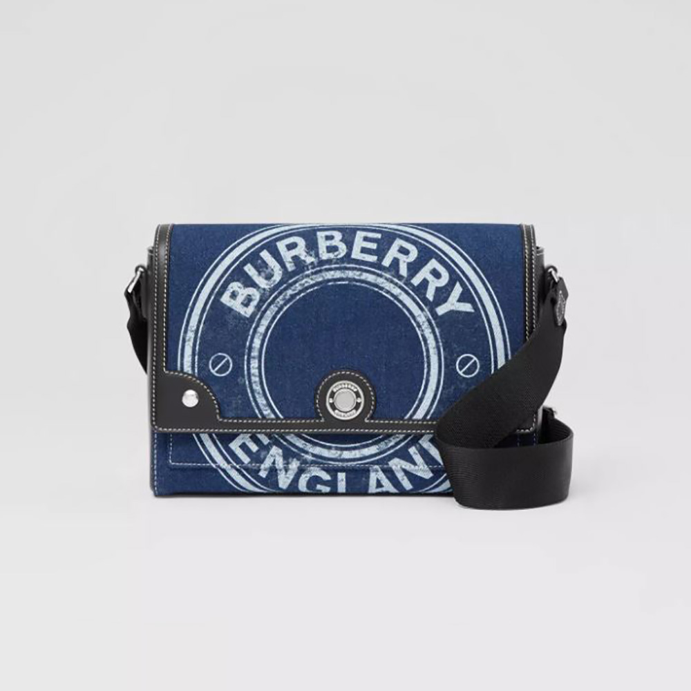 Front view of Burberry Women Logo Graphic Denim Note Crossbody Bag in blue