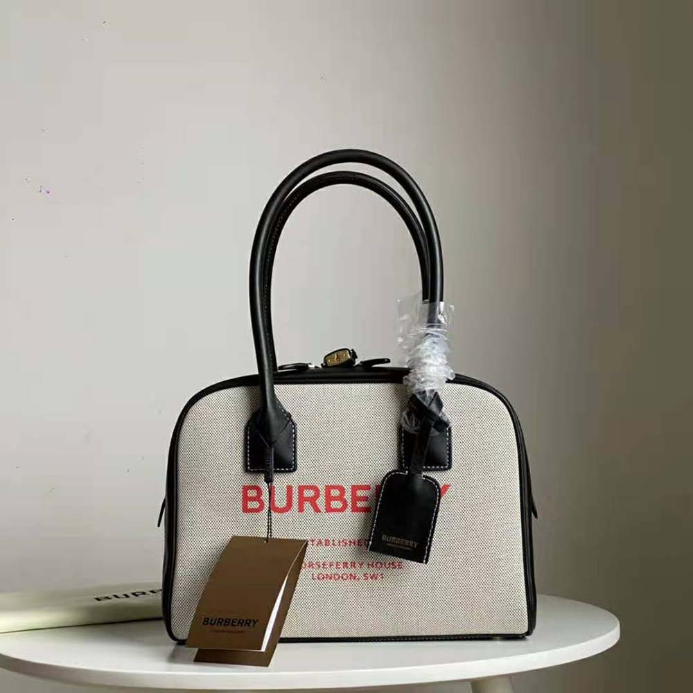 Close-up of Burberry signature Horseferry print on cotton canvas bag