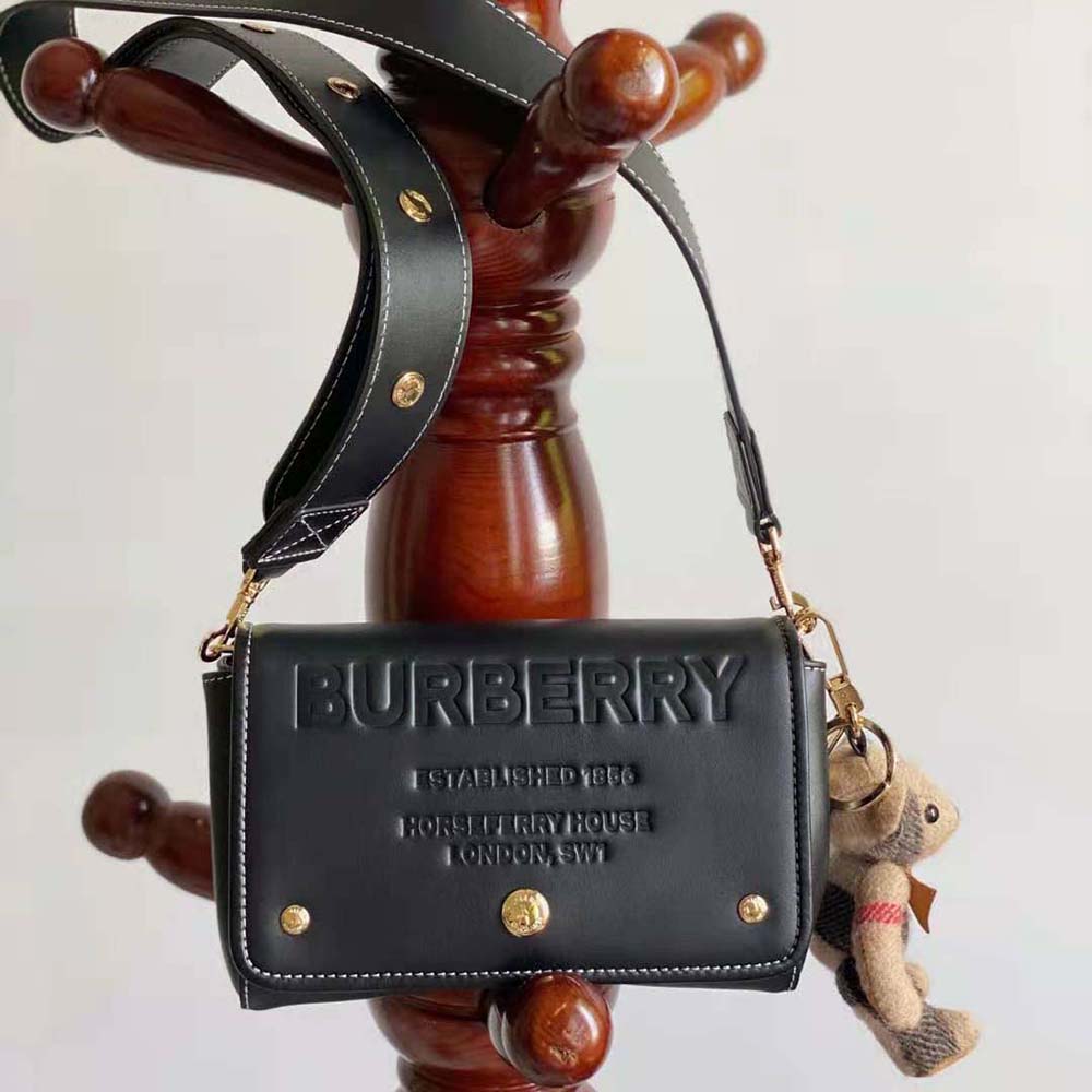 Side angle showing silhouette of Burberry Women Small Horseferry Leather Crossbody Bag-Black