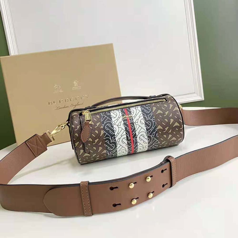 Side profile showing brown leather and multicolor stripe on Burberry barrel bag