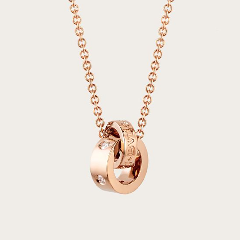 Close-up of Bvlgari Women Necklace with 18 KT Rose Gold Chain clasp detail