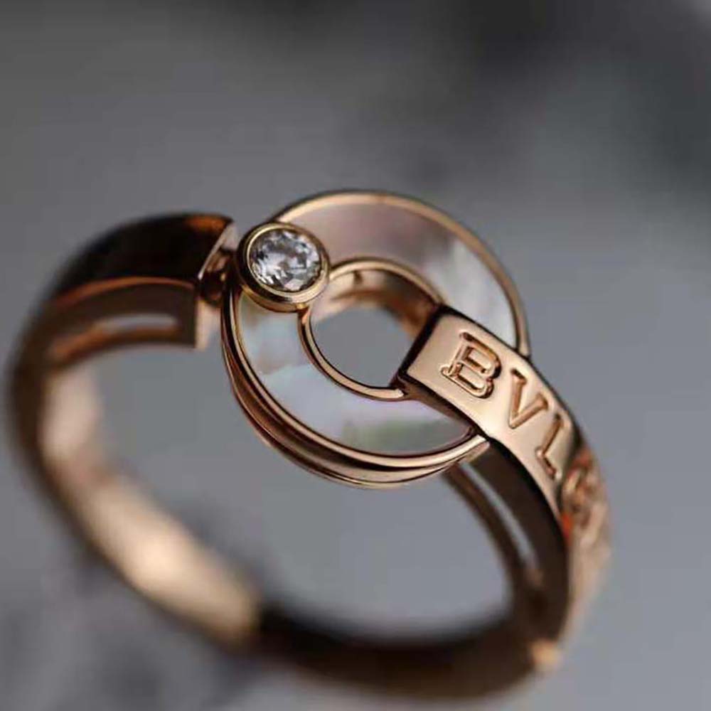 Bvlgari Women Openwork 18 KT Rose Gold Ring worn on hand outdoors