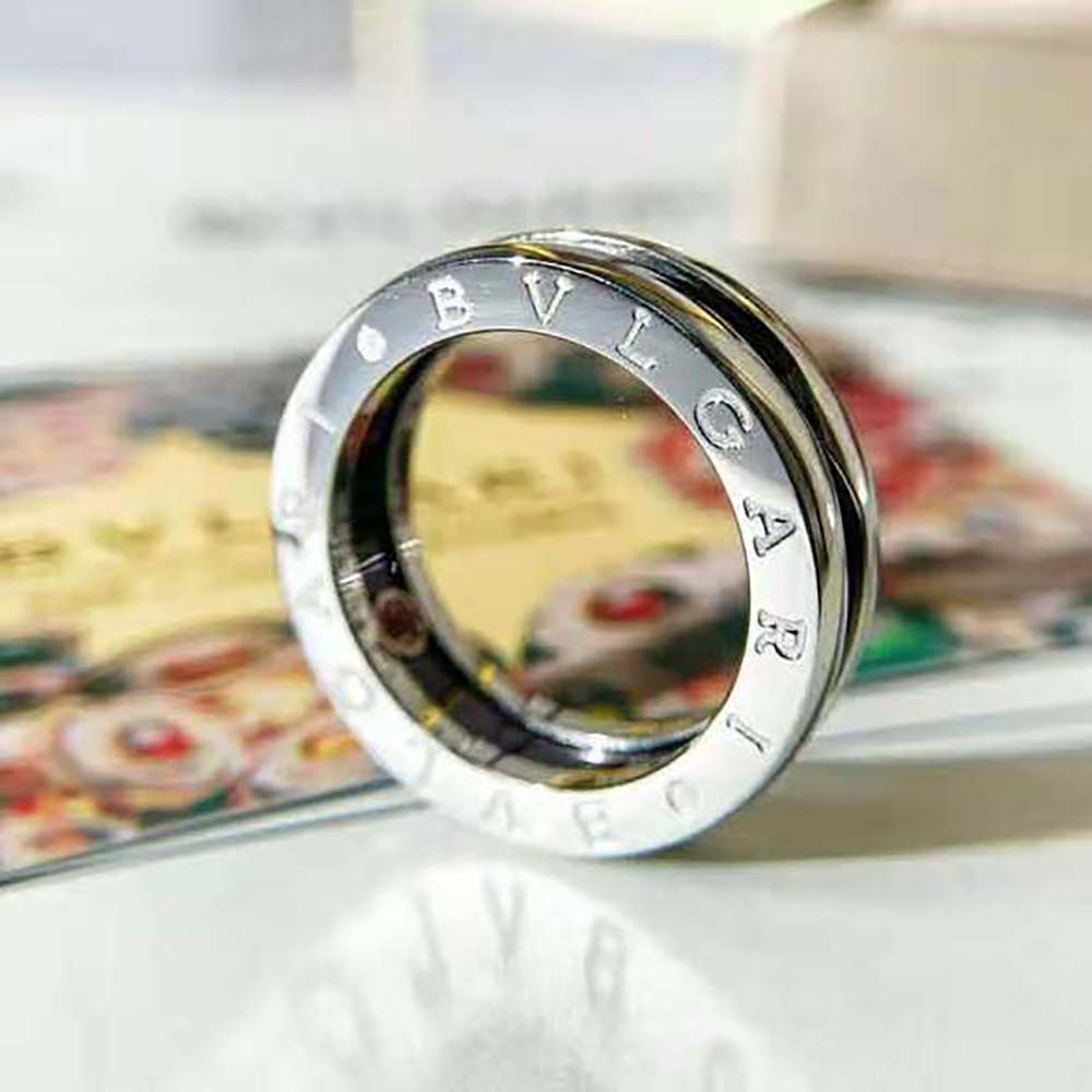 Side angle showing the smooth sterling silver and black ceramic contrast ring