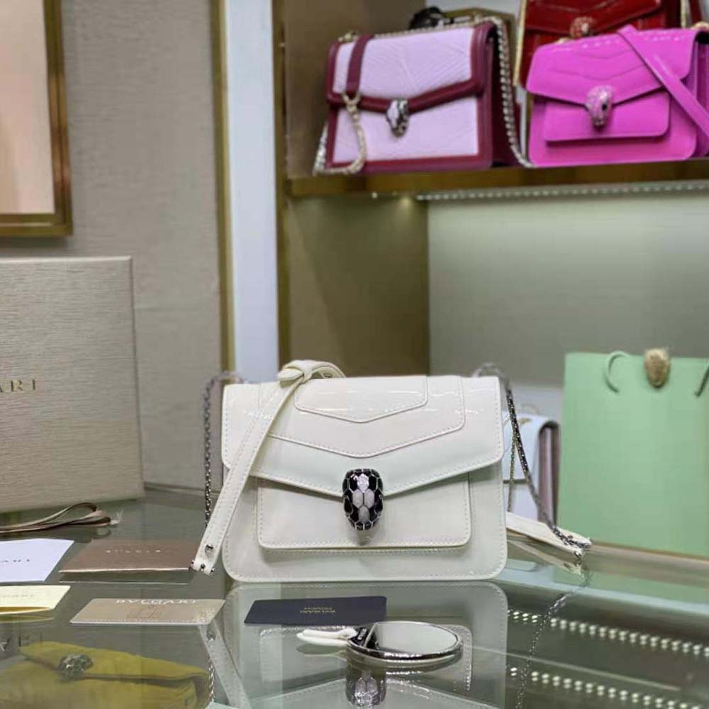 Close-up of signature snakehead clasp on Bvlgari Women Serpenti Forever Crossbody Bag