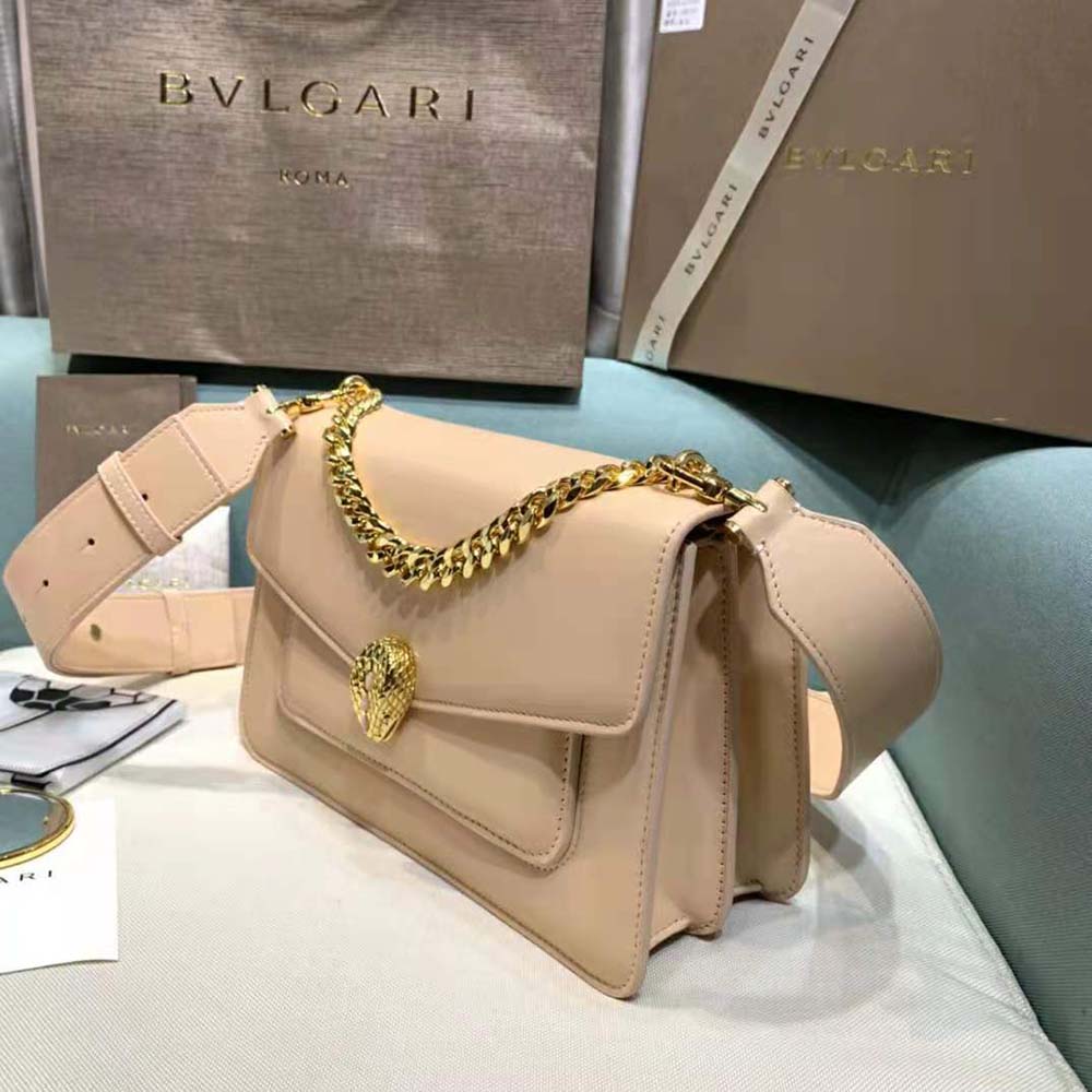 Side angle showing adjustable strap and silhouette of Bvlgari Sandy bag