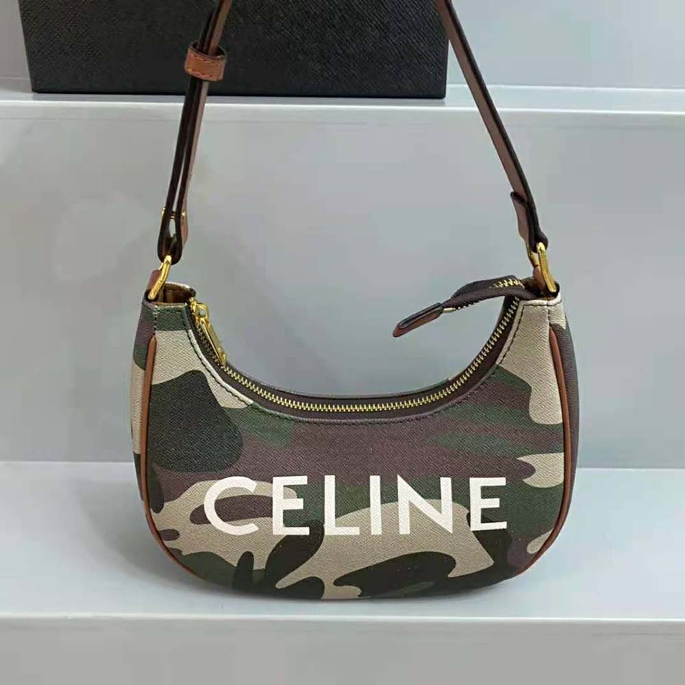 Close-up detail of green camouflage and Celine logo on AVA Bag canvas
