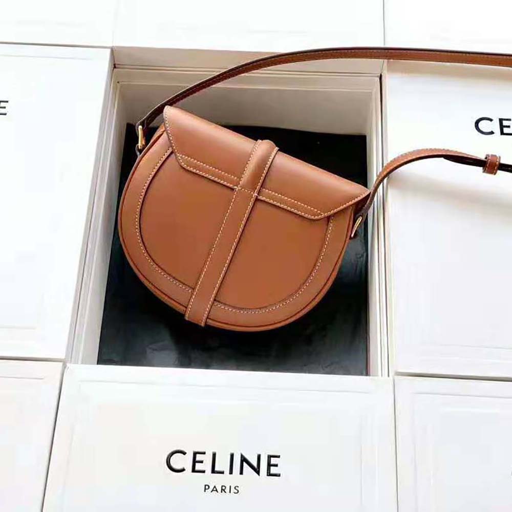 Side angle showing silhouette and adjustable strap on Celine Women Besace 16
