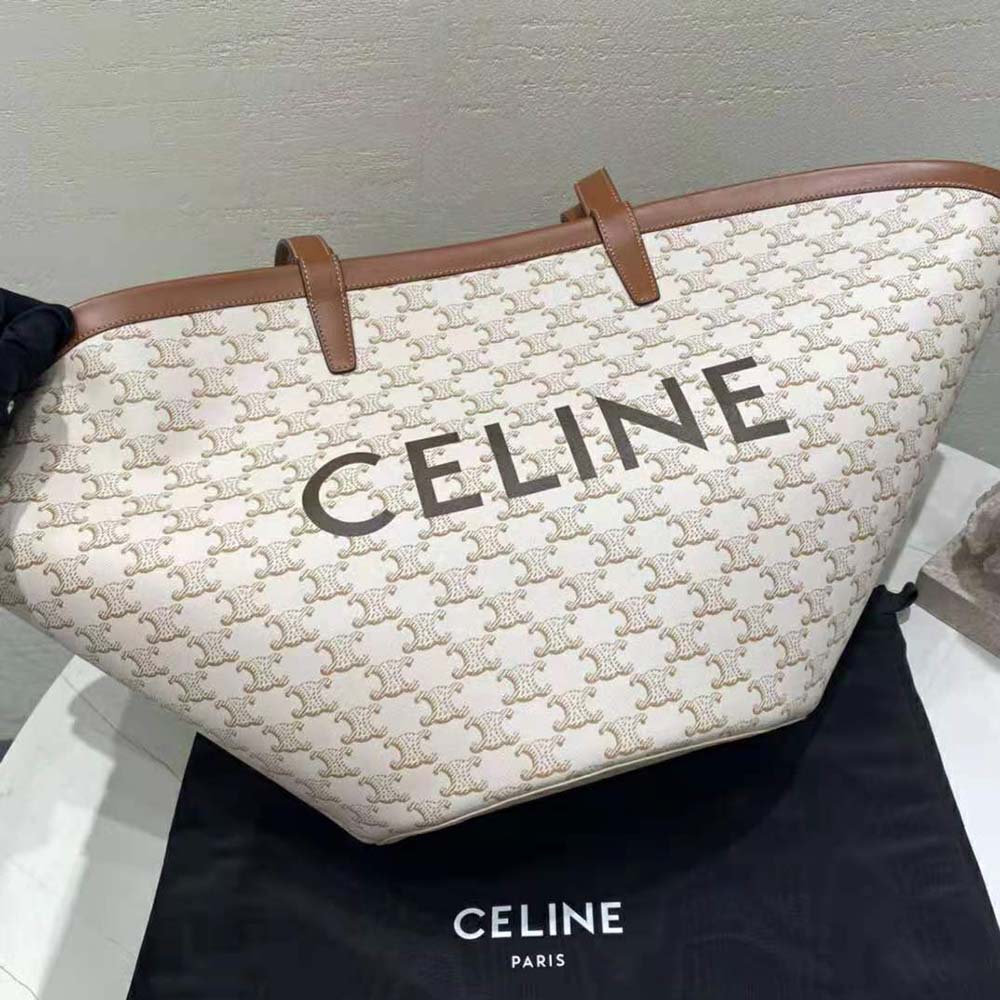 Side angle showing spacious interior and zipper closure of Celine Large Couffin