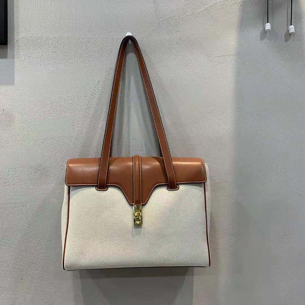 Close-up of gold-tone hardware and flap closure on Celine Women Medium Soft 16 Bag