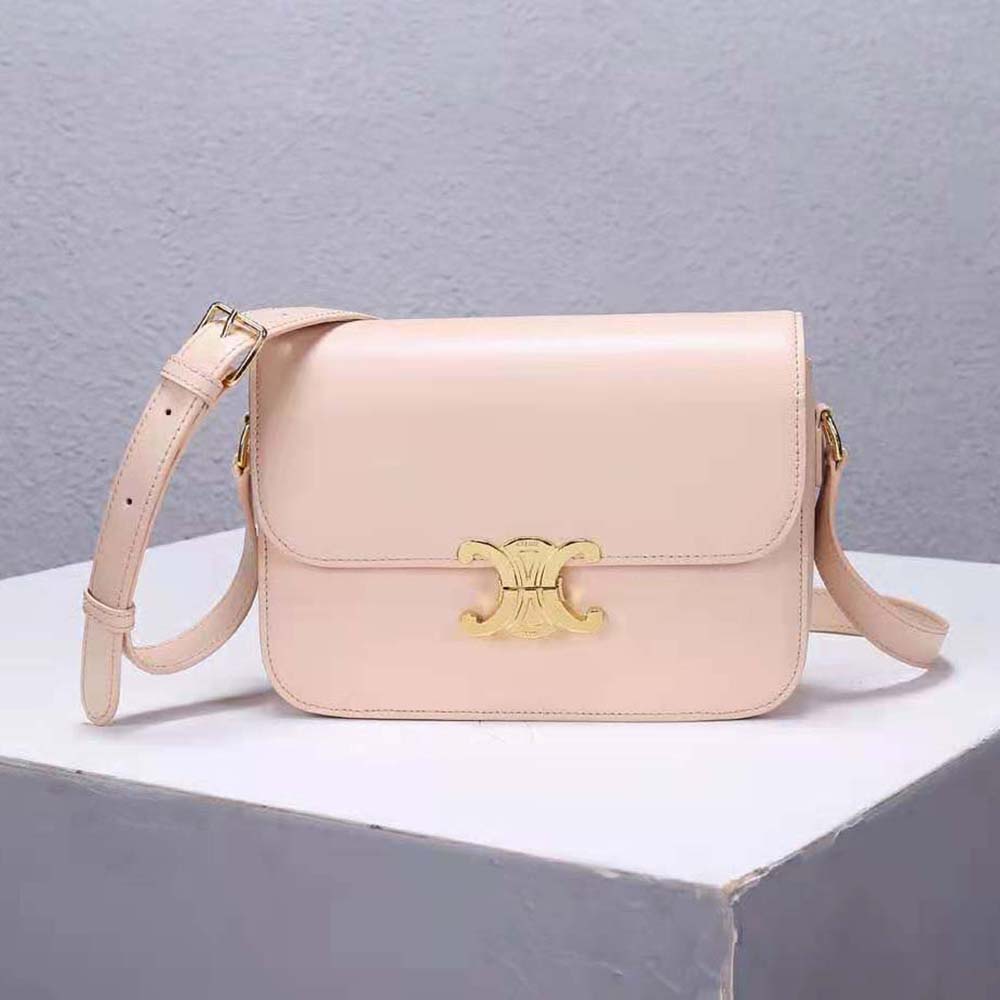 Close-up of gold-tone Triomphe clasp on Celine Women Medium Triomphe Bag
