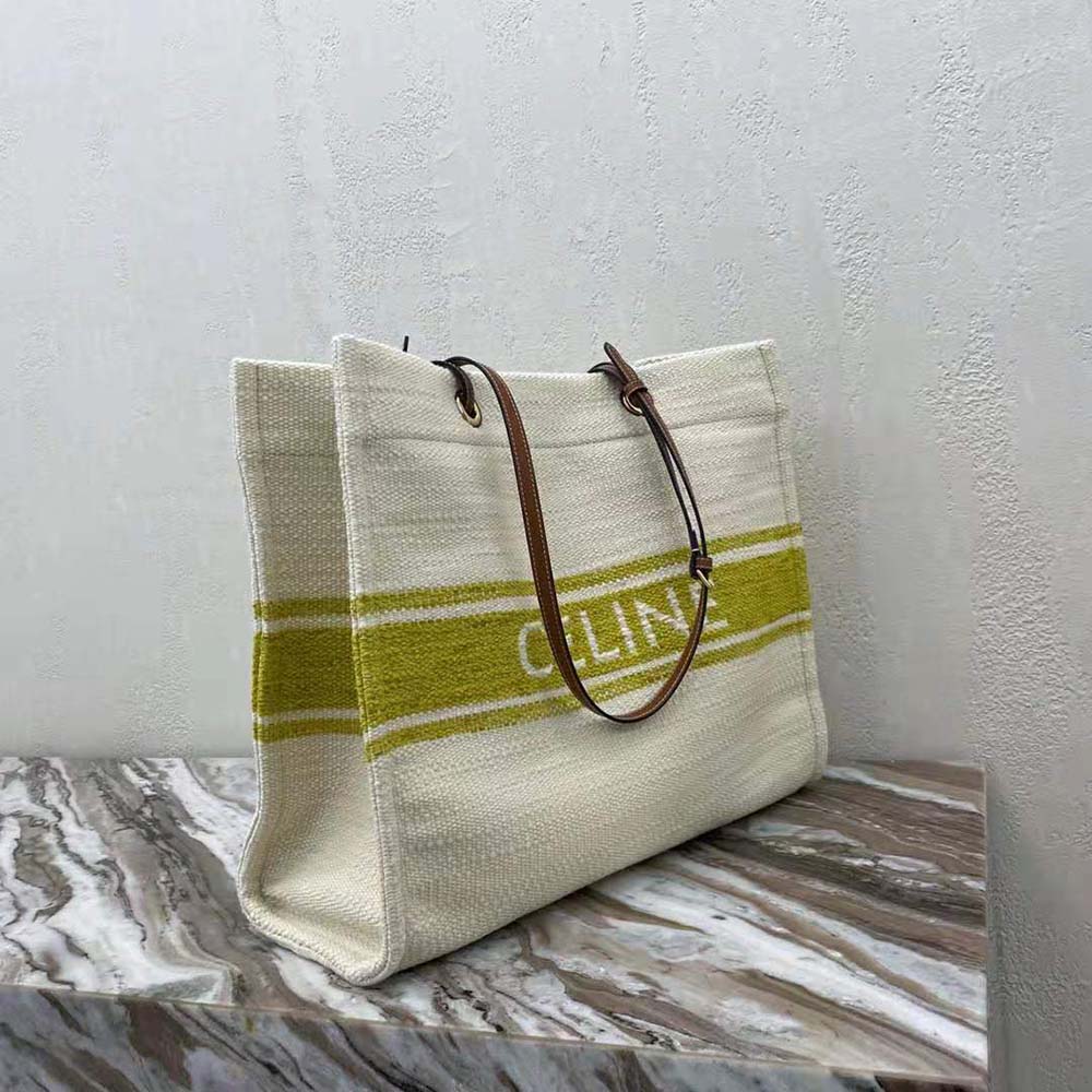 Side angle showcasing squared silhouette of Celine Women Squared Cabas Celine handbag