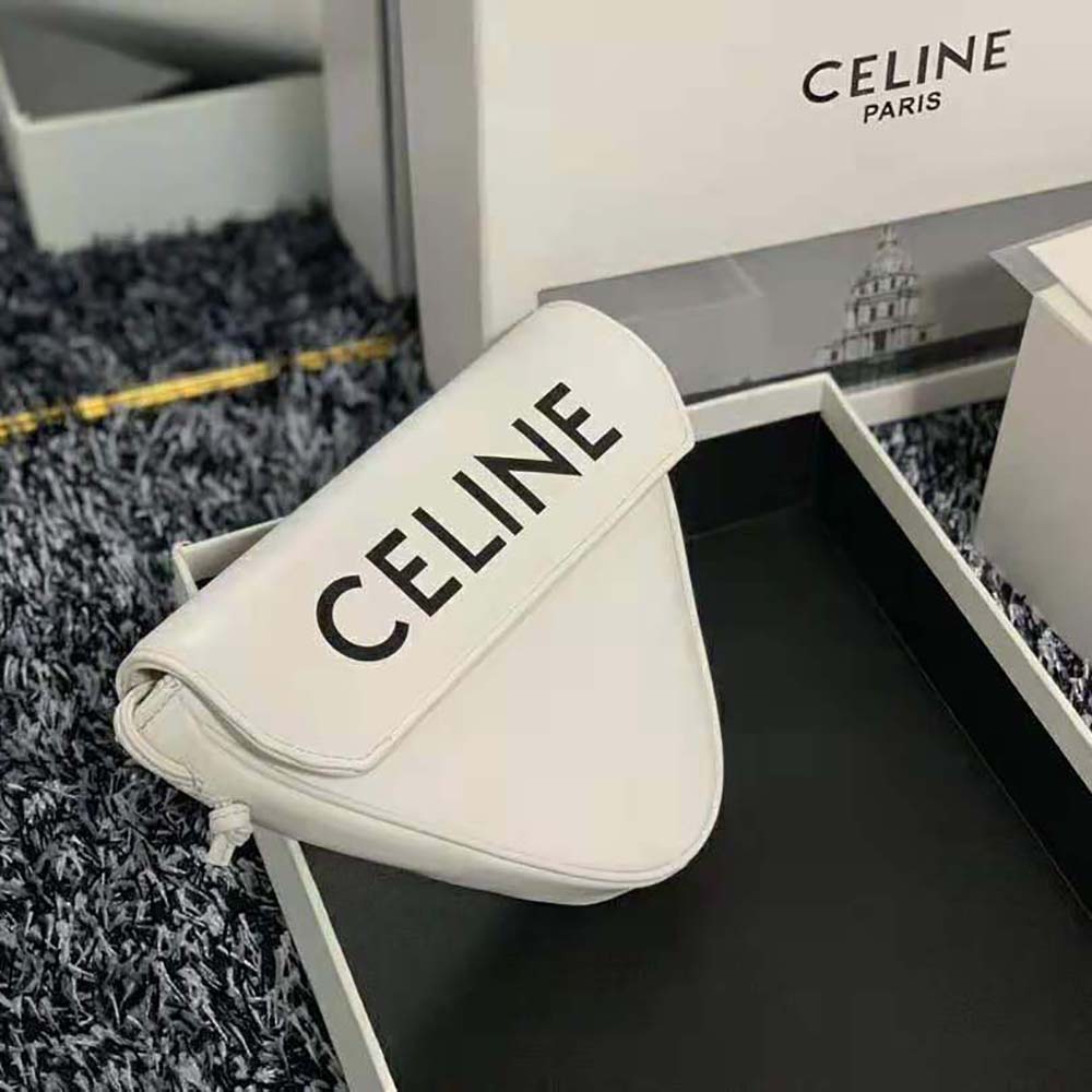 Side angle showing adjustable strap of Celine Women Triangle Bag in white