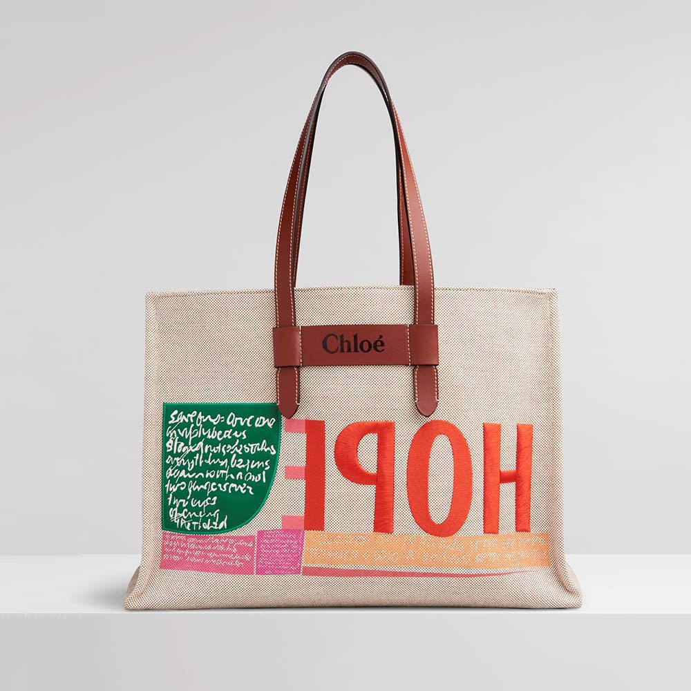Front view of Chloe Women Corita Kent Large Tote in beige with embroidery