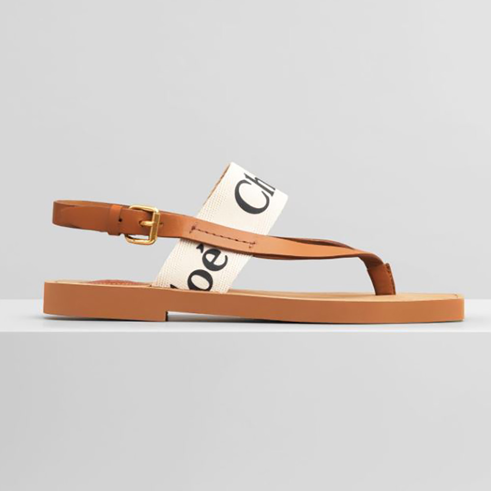 Side view of Chloe Women Woody Flat Sandal in Calfskin and Canvas-White