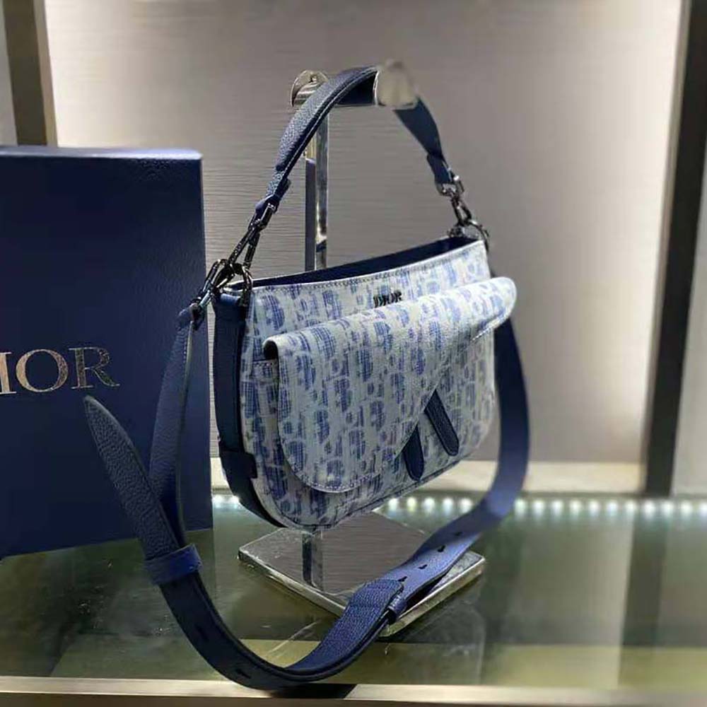 Side angle showing soft silhouette of Dior Men Mini Saddle Soft Bag