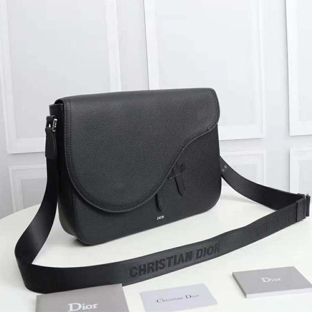 Side angle showing adjustable strap on Dior Men Saddle Messenger Bag
