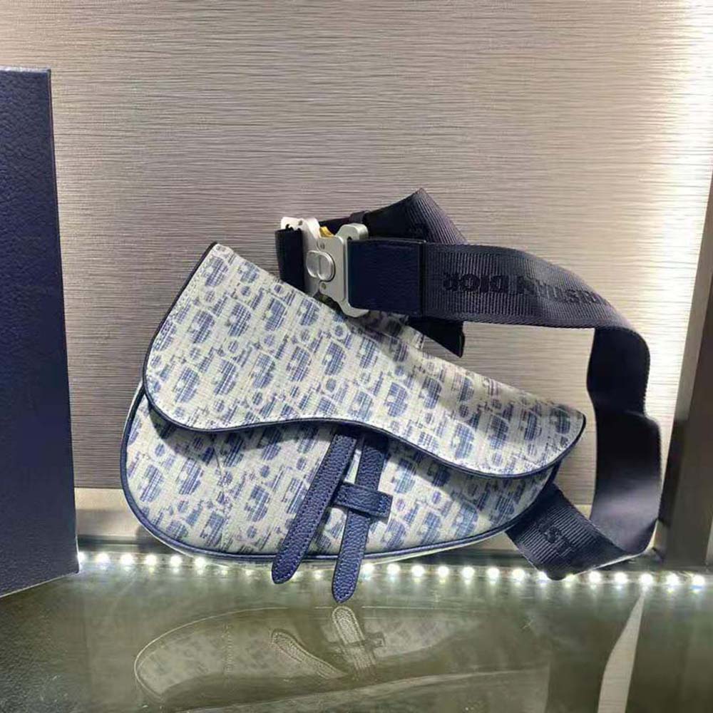 Side profile highlighting compact silhouette of Dior Men Saddle bag