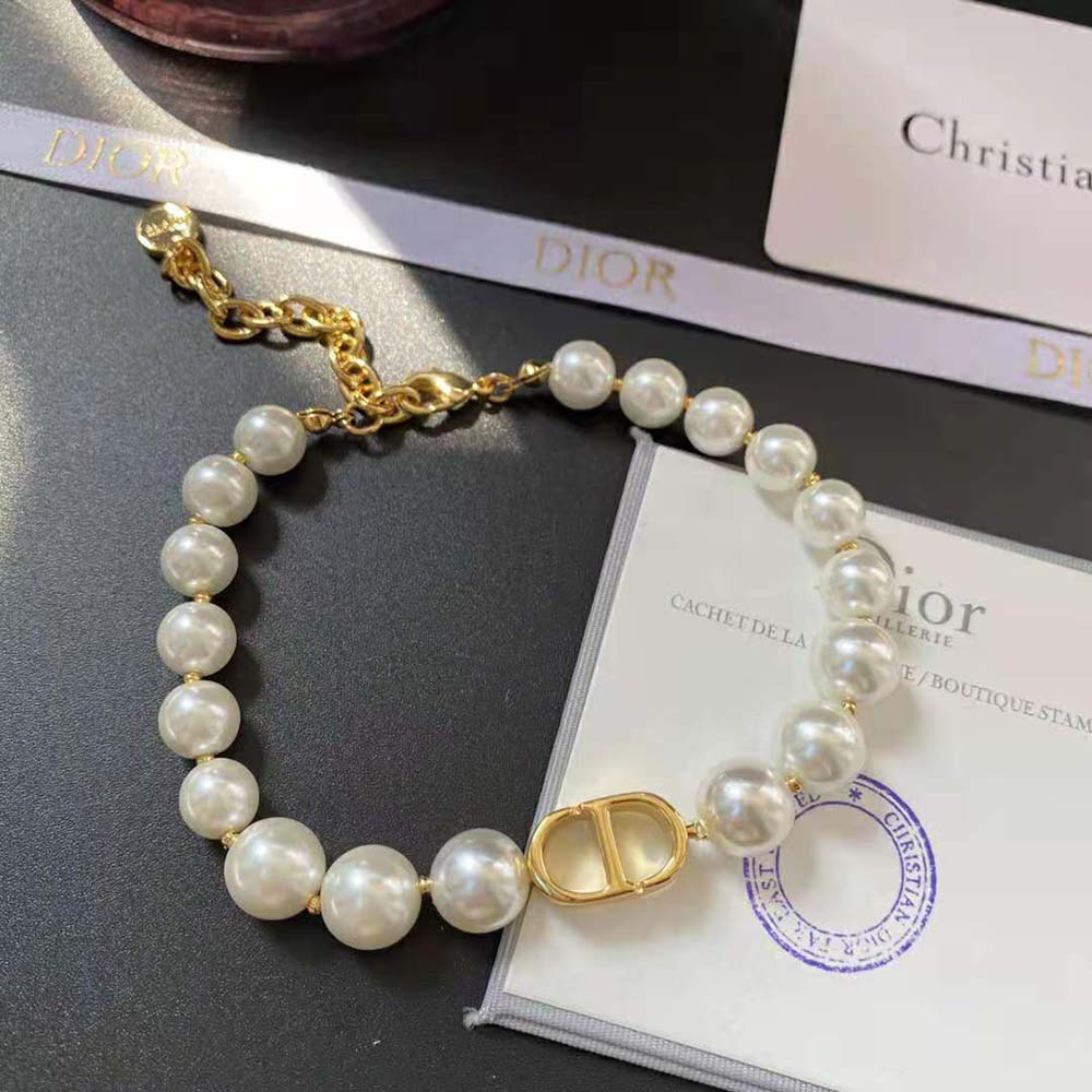 Side angle showing white resin pearls on Dior Women 30 Montaigne Bracelet