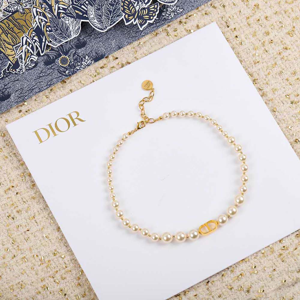 Side angle showing white resin pearls on Dior Women 30 Montaigne Choker