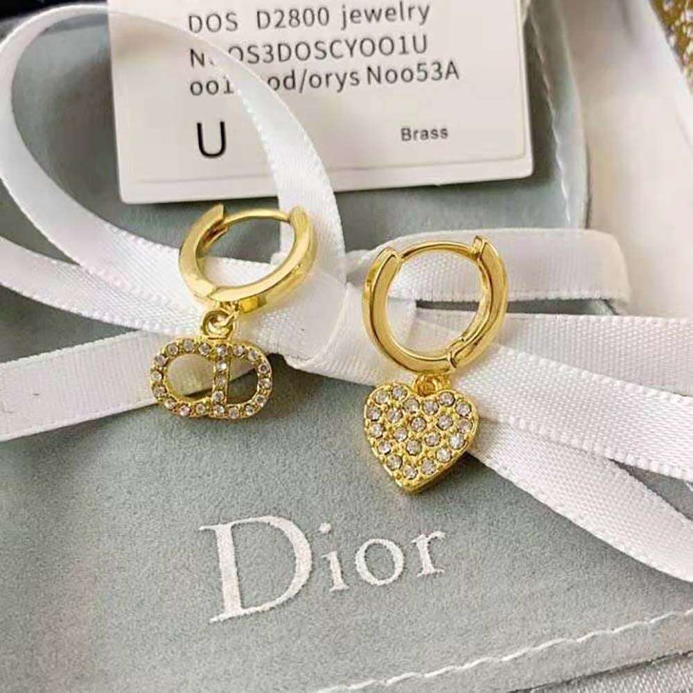 Side angle highlighting crescent shape of Dior Women Clair D Lune Earrings
