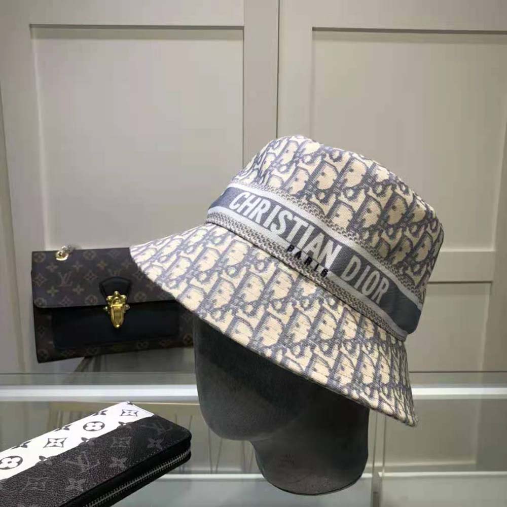 Close-up of signature D-oblique pattern on Dior bucket hat
