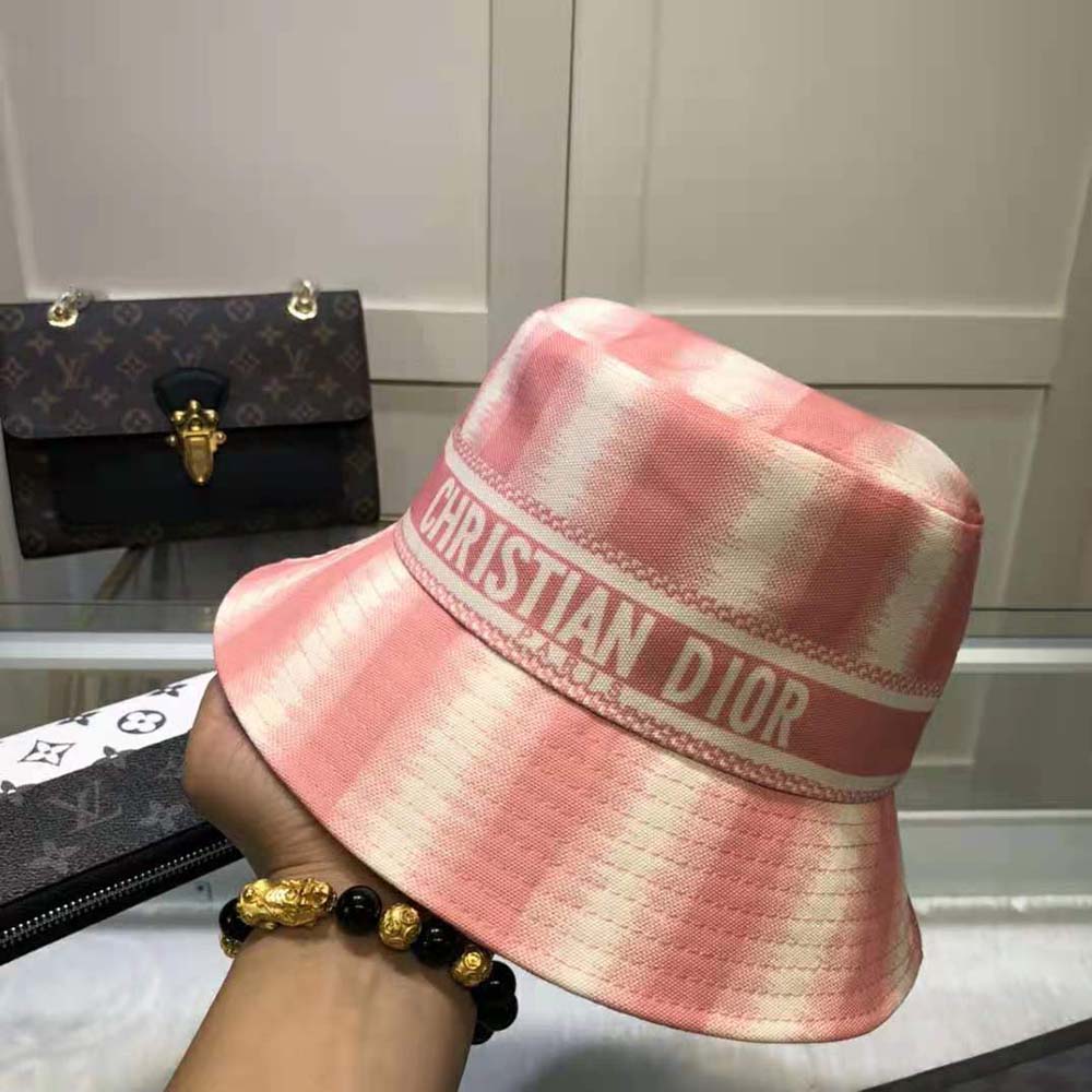 Side angle showing small brim of Dior Women D-stripes Bucket Hat