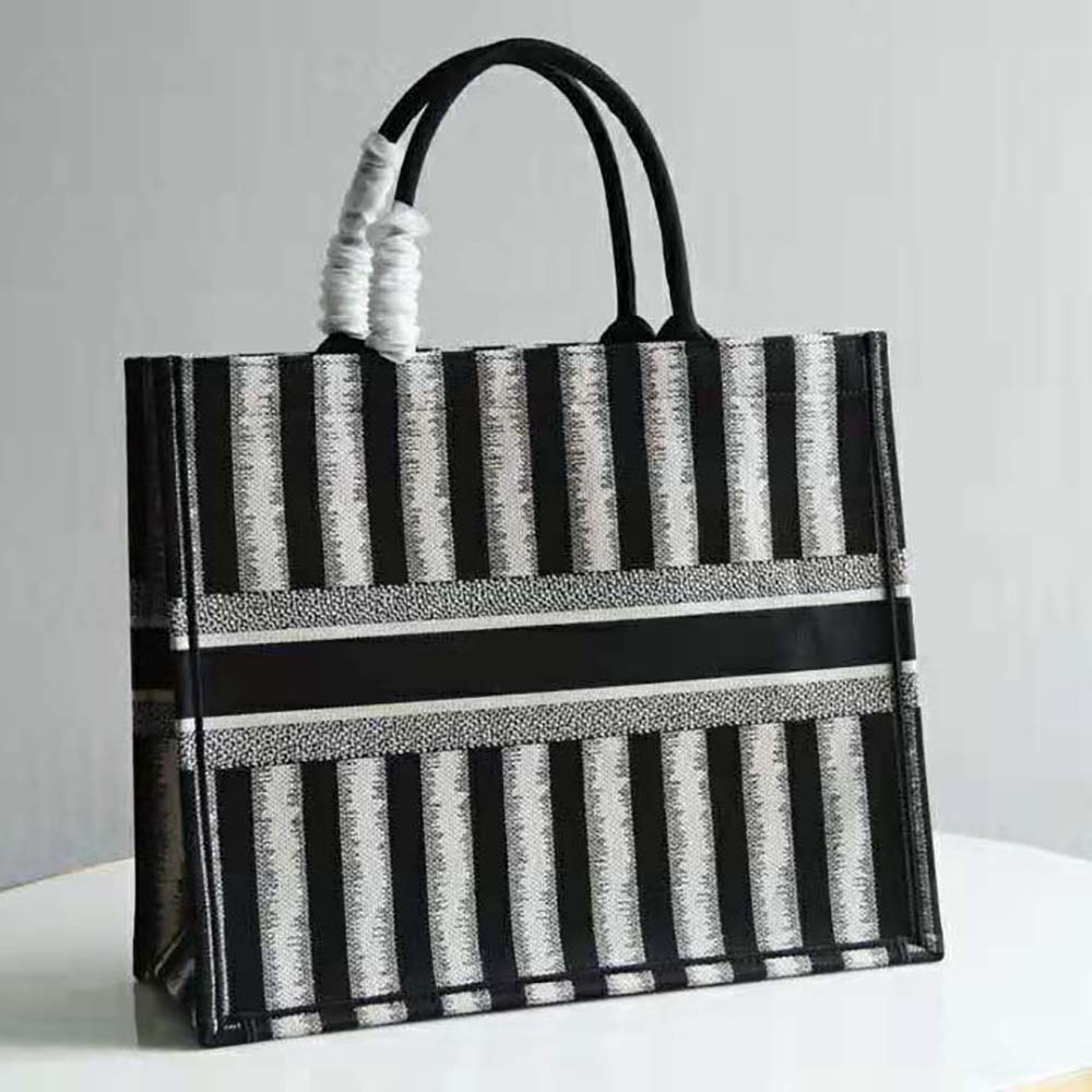 Side profile showing spacious silhouette of Dior Women Dior Book Tote