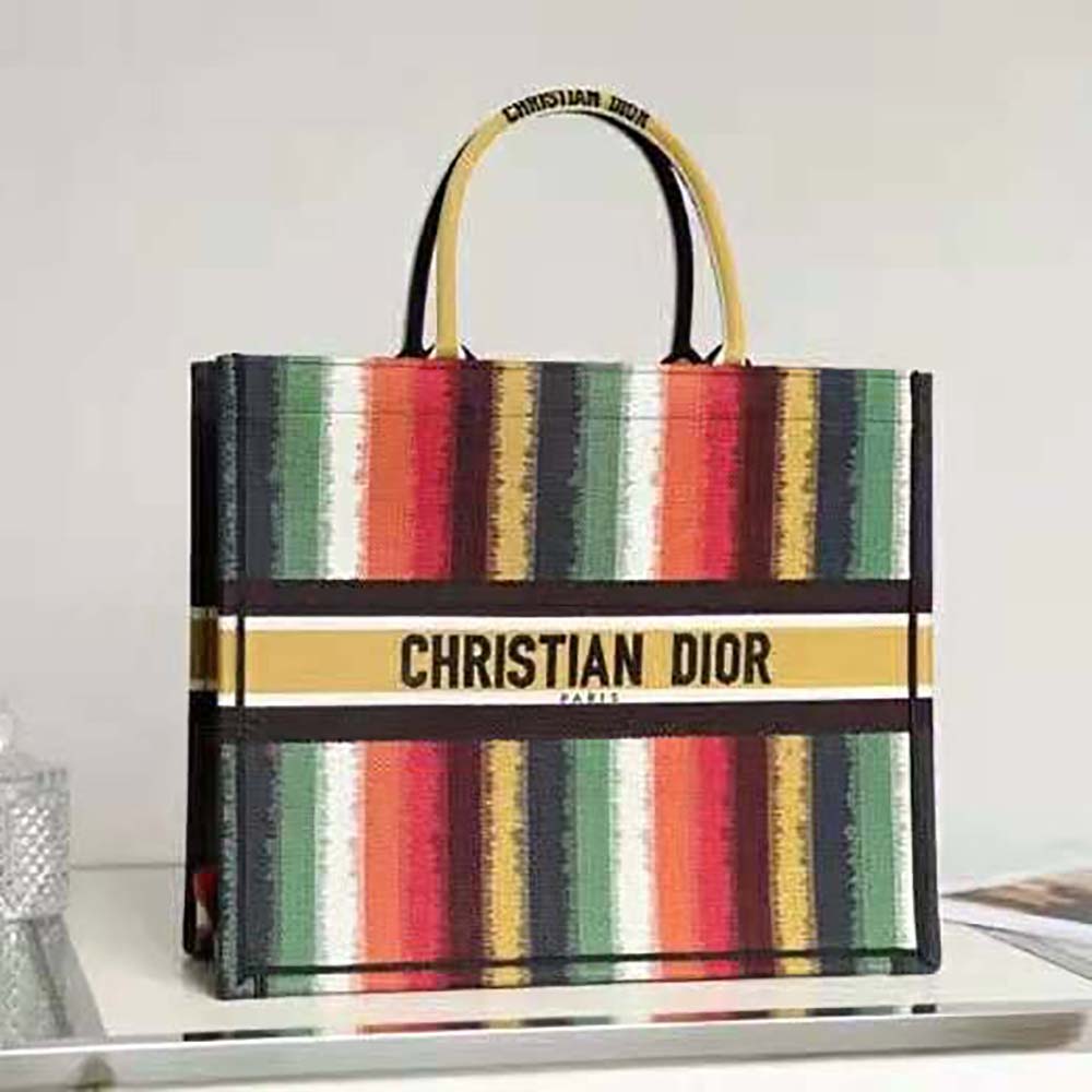 Close-up of red canvas and multicolor D-Stripes embroidery detailing