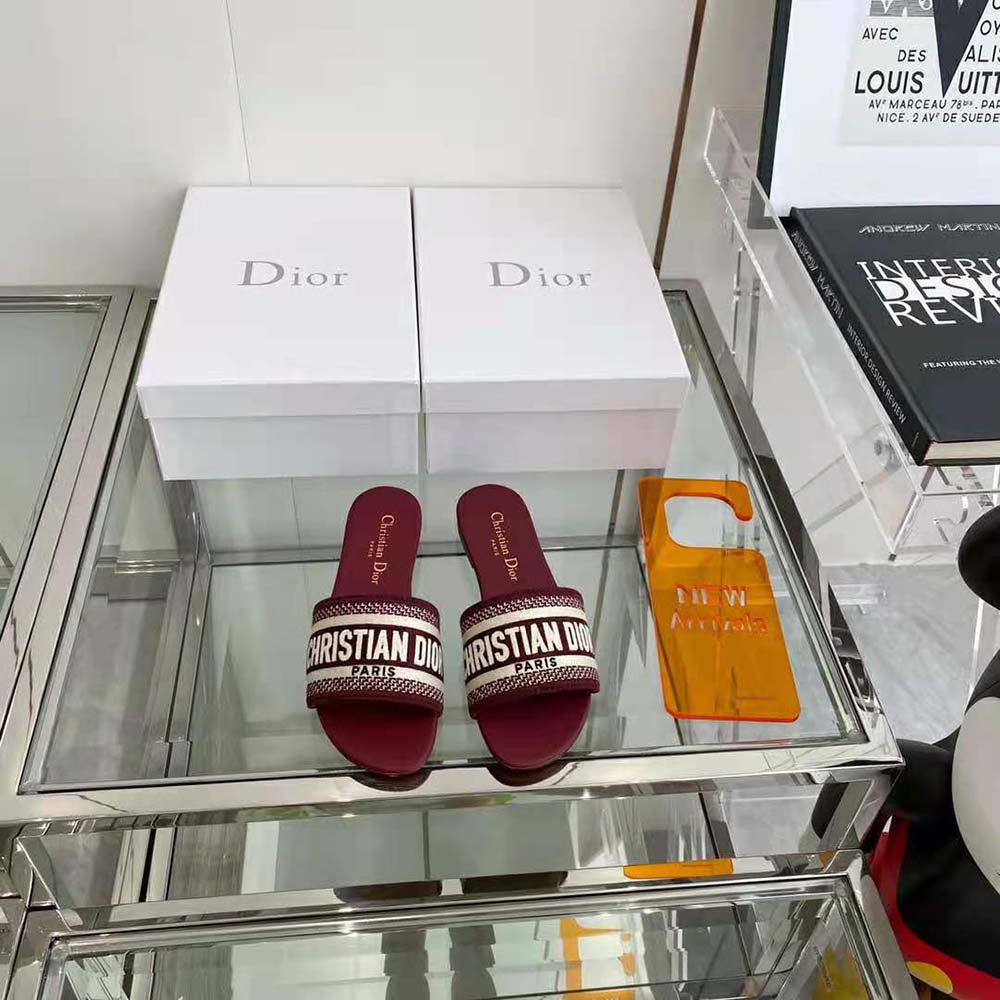 Close-up detail of Dior embroidery on Burgundy cotton slide