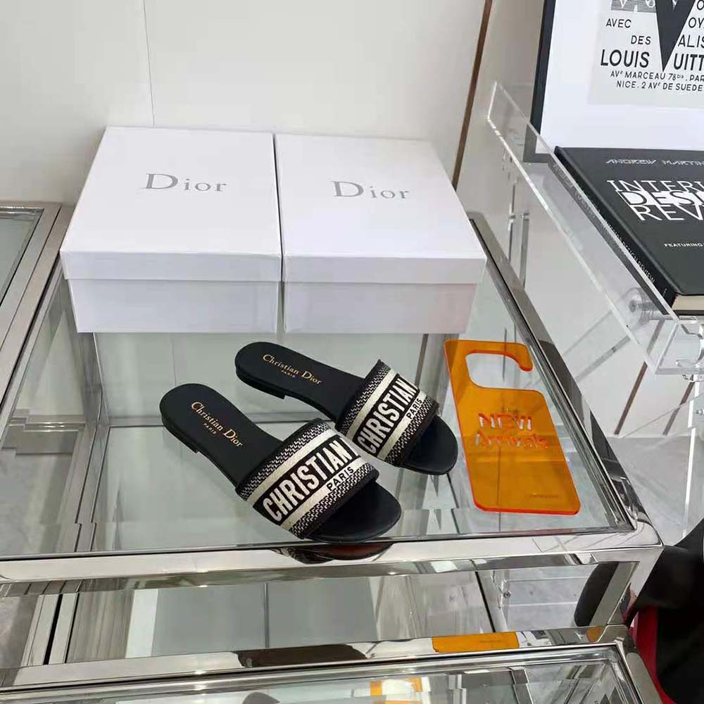 Top view showing black leather footbed and Dior hardware detail