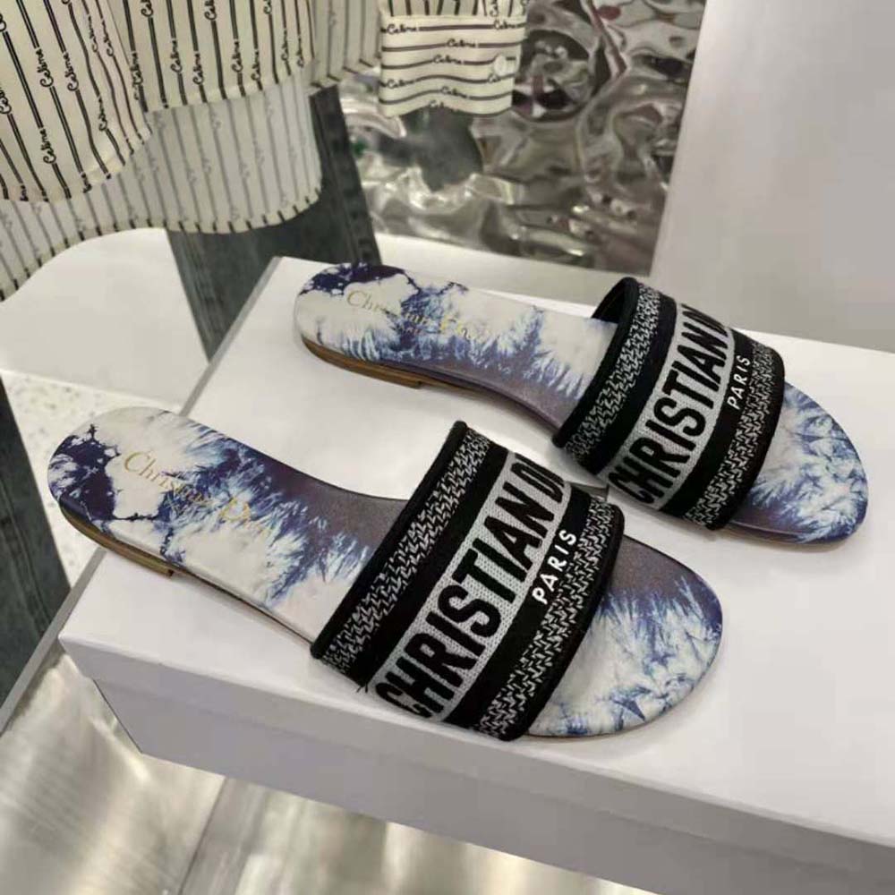 Side profile showing tie closure on Dior Women Dway Slide Denim Blue