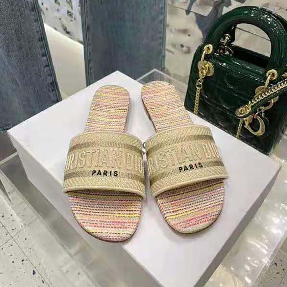 Close-up of gold-tone metallic embroidery on Dior Women Dway slide upper