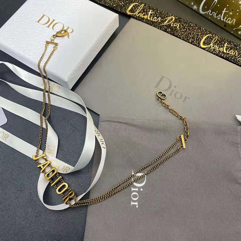 Front view of Dior Women J’Adior Choker Antique Gold-Finish Metal on display