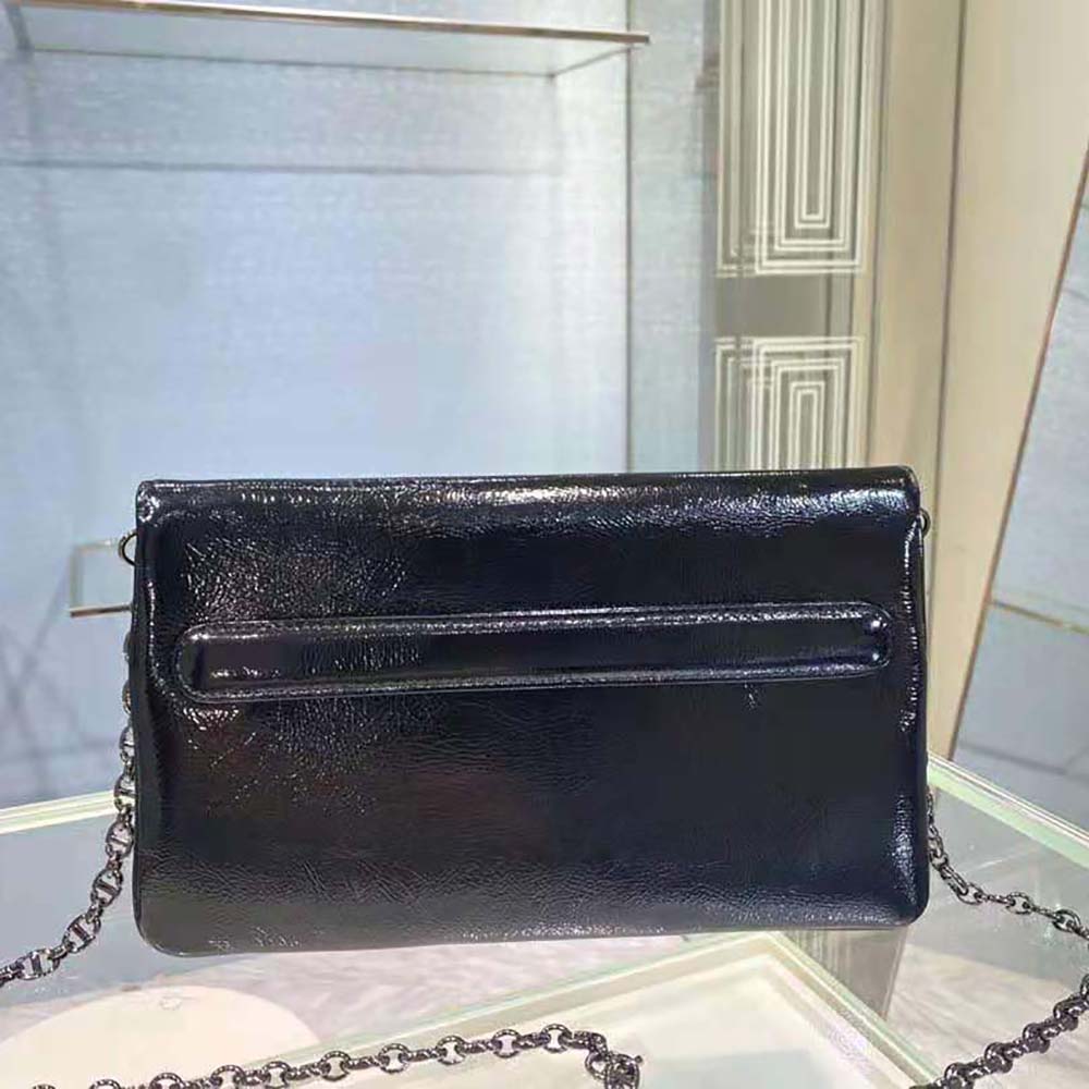 Side angle showing the structured silhouette of Dior Medium Diordouble Bag