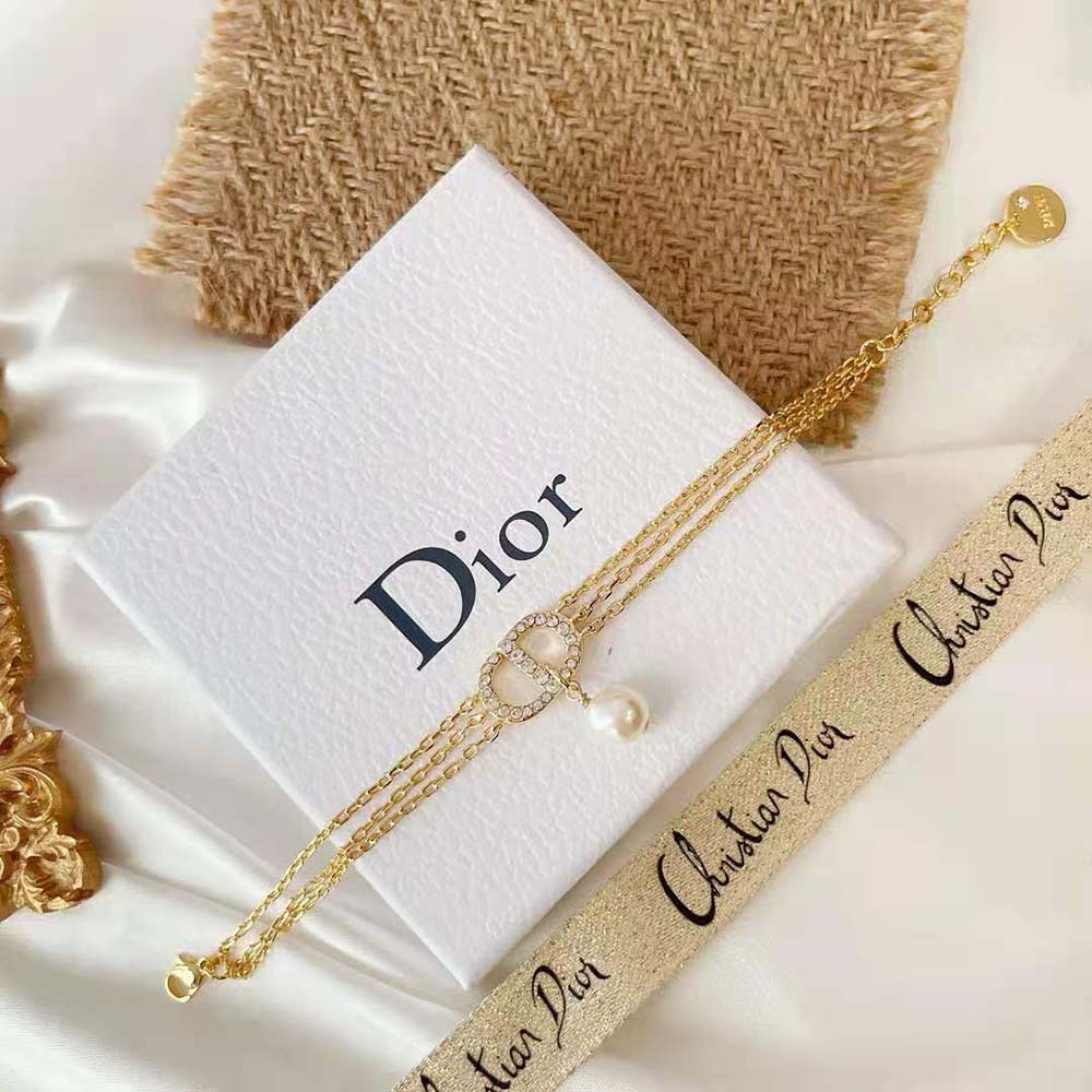 Full view of Dior Women Multi-chain Petit CD Bracelet gold-finish multi-chain silhouette