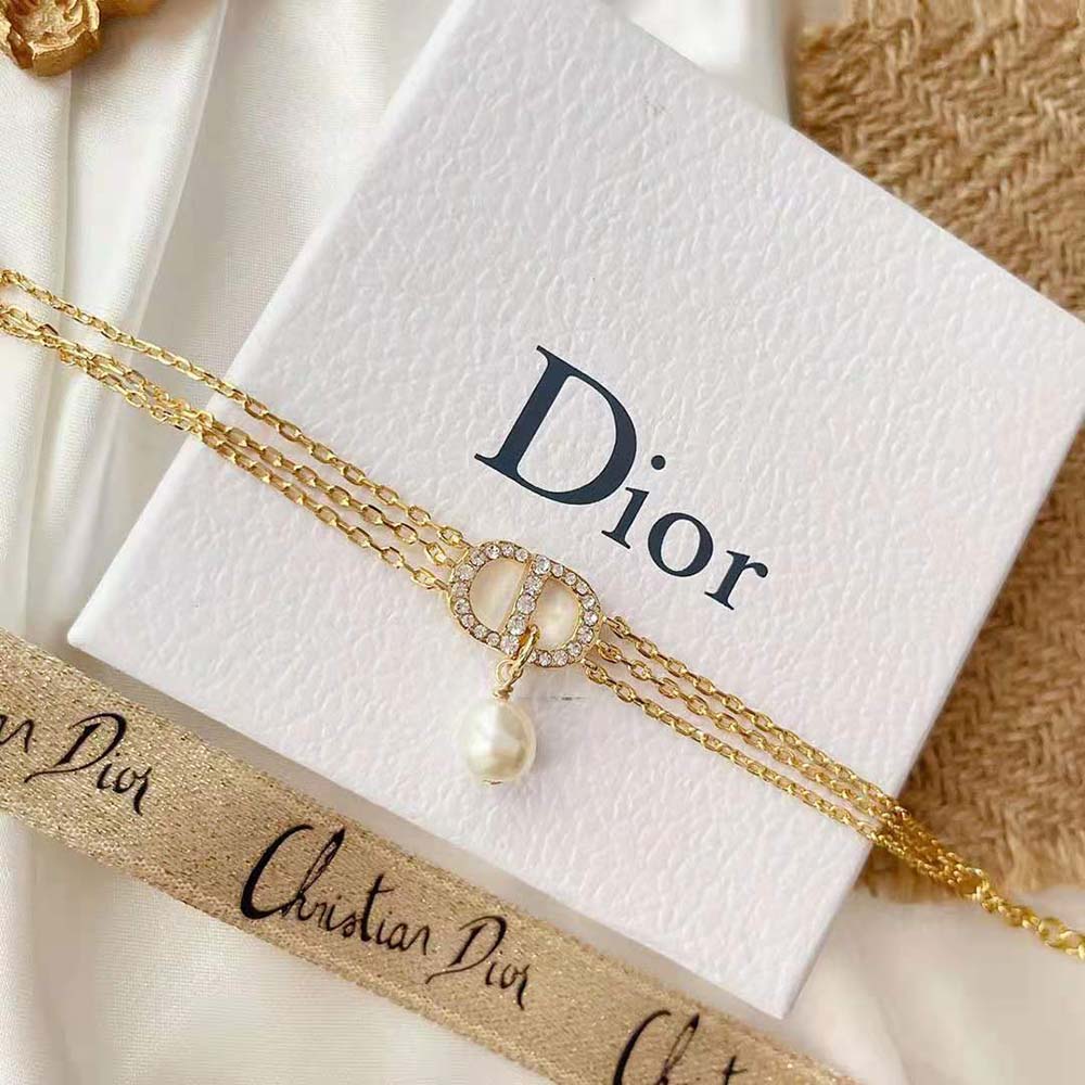 Side angle showing clasp and layered chains of Dior Women Multi-chain Petit CD Bracelet