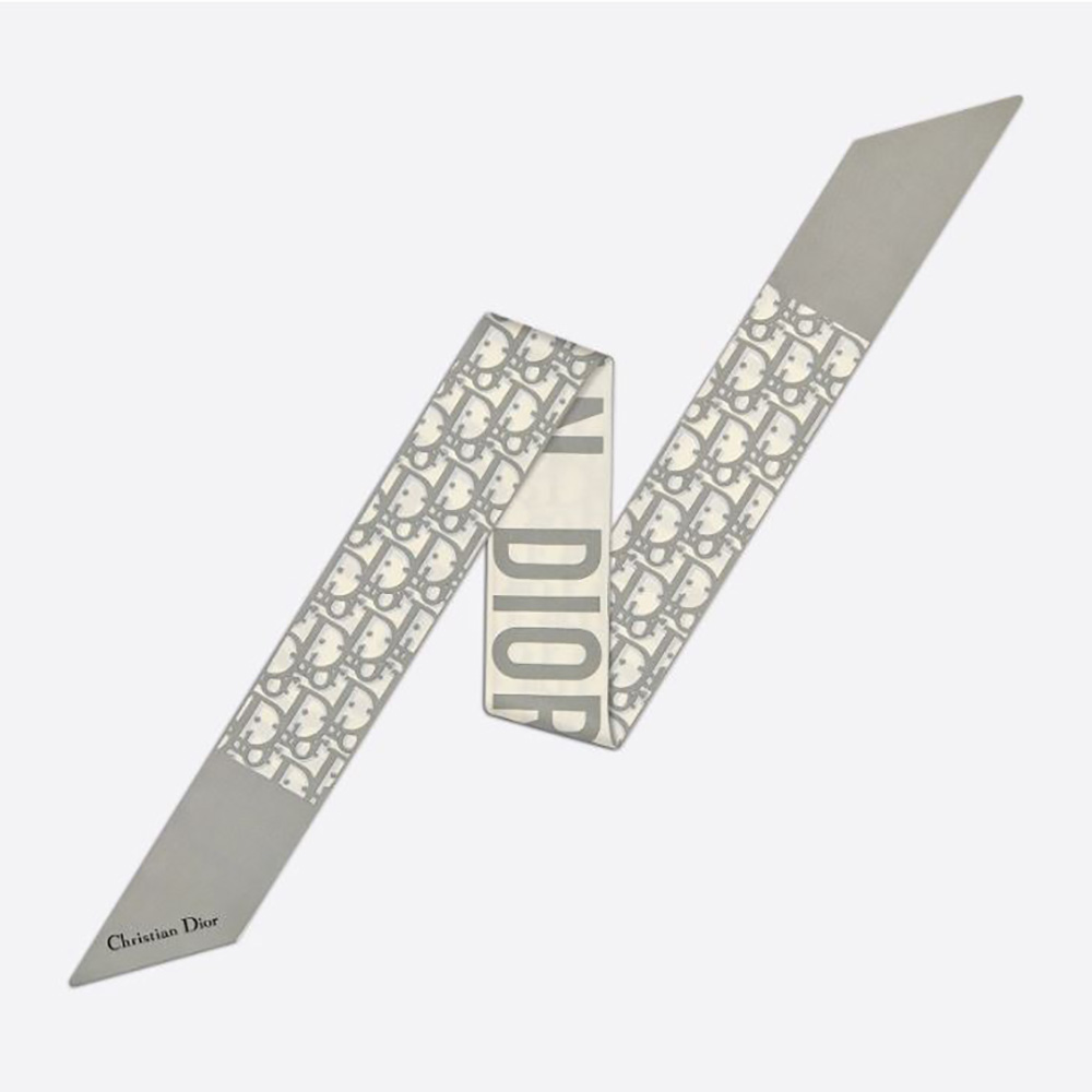 Close-up of Dior Women Oblique Mitzah Scarf Gray Silk Twill texture and edges