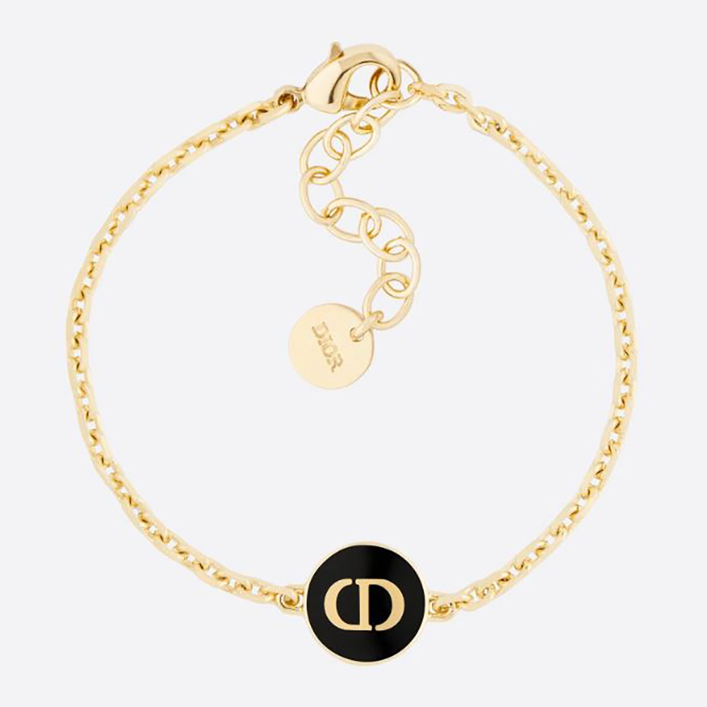 Close-up front view of Dior Women Petit CD Bracelet Gold-Finish Metal and Black Lacquer