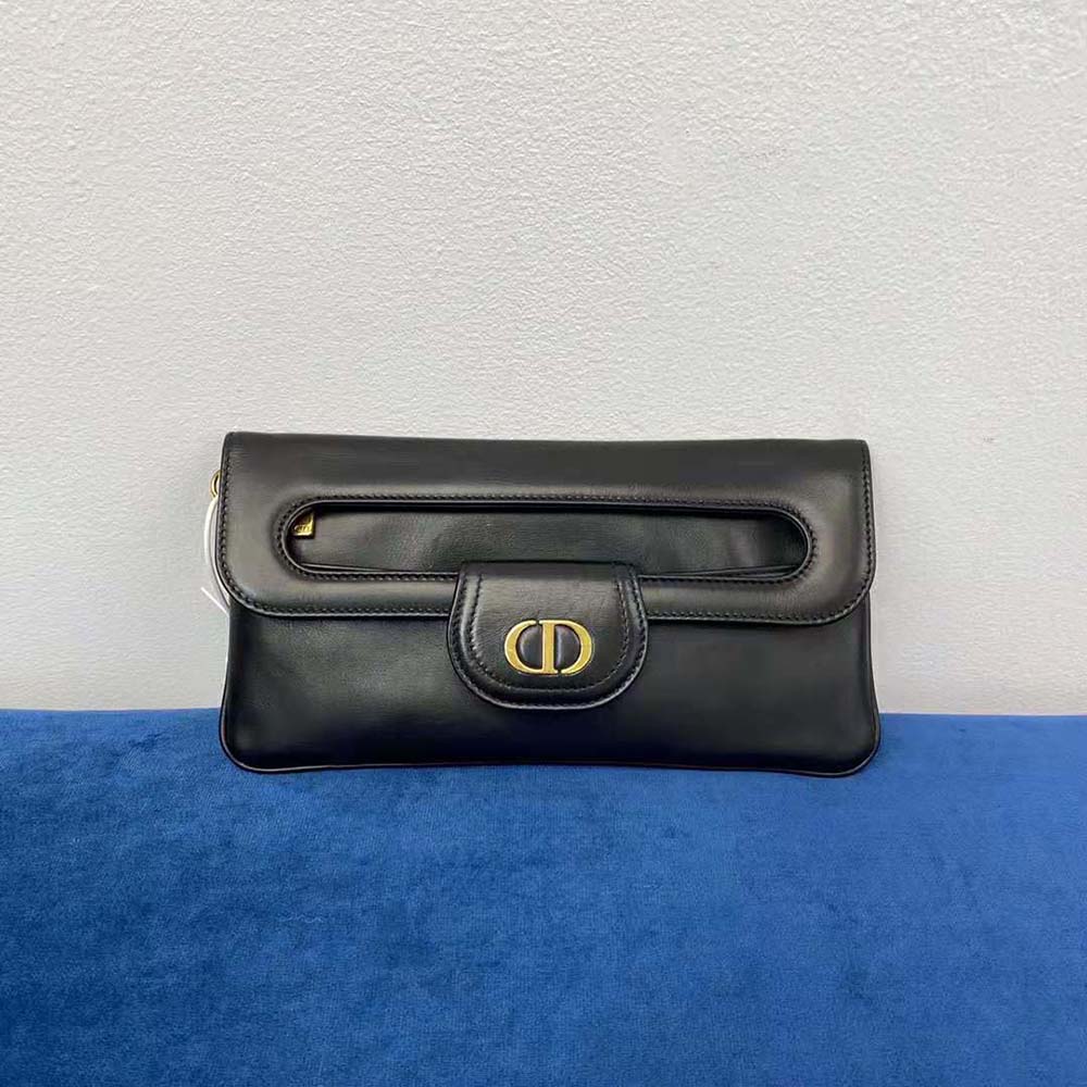 Close-up of gold double-D hardware on Dior Women Small Diordouble Bag